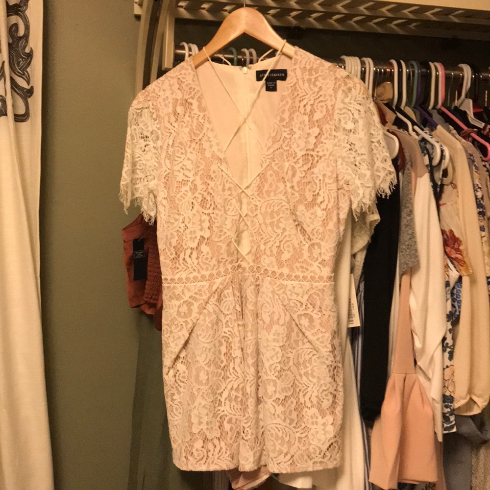 White romper with pockets